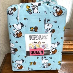 Peanuts Blue Queen Sheet Set with Snoopy and Woodstock Easter Theme. Queen size.